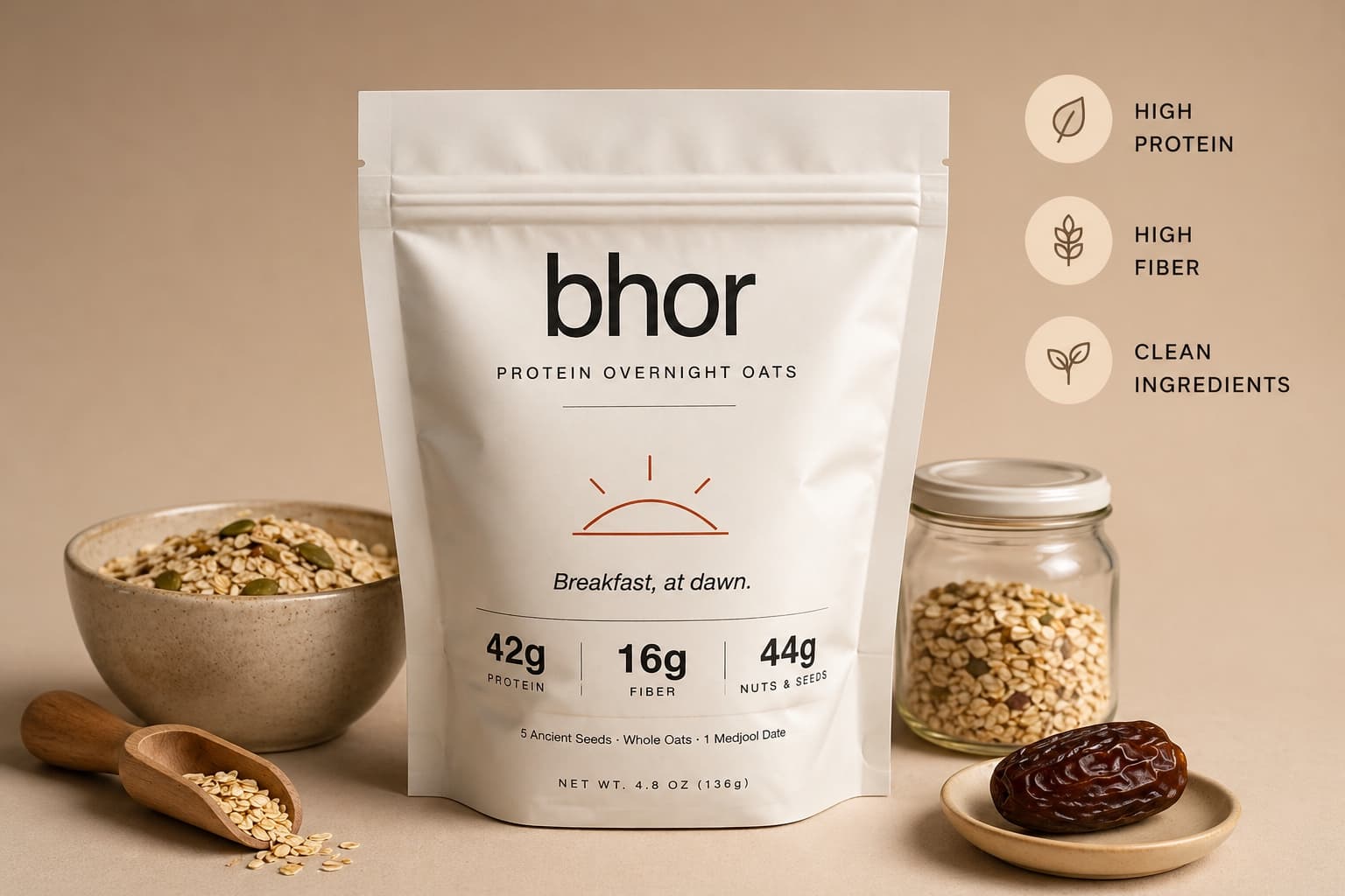 bhor Original pouch flanked by a bowl of oats and seeds, a jar of grains, a Medjool date, and a wooden scoop, with HIGH PROTEIN, HIGH FIBER, and CLEAN INGREDIENTS callouts